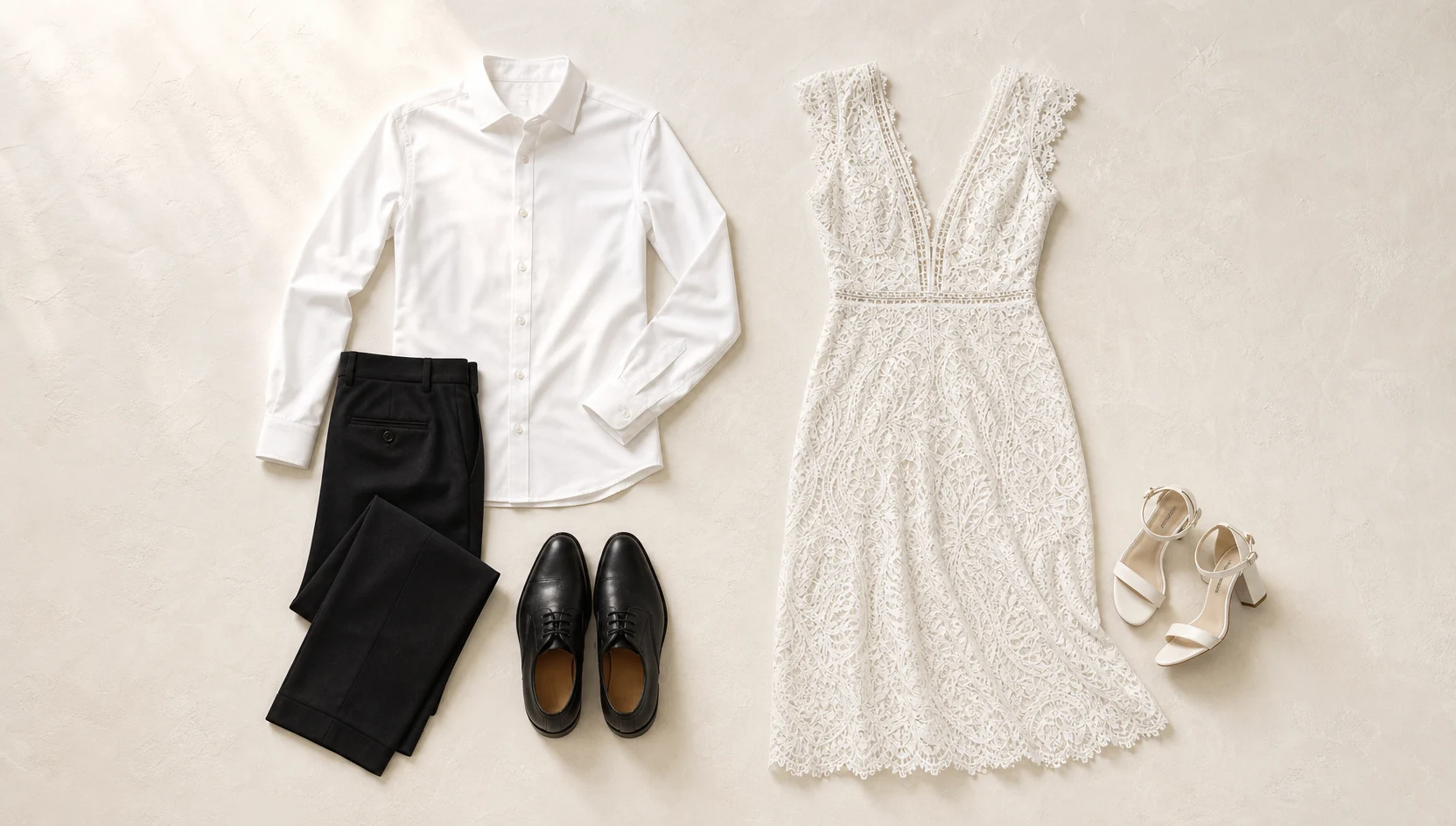Outfit ideas for close seated embrace in dramatic beam of light engagement photos