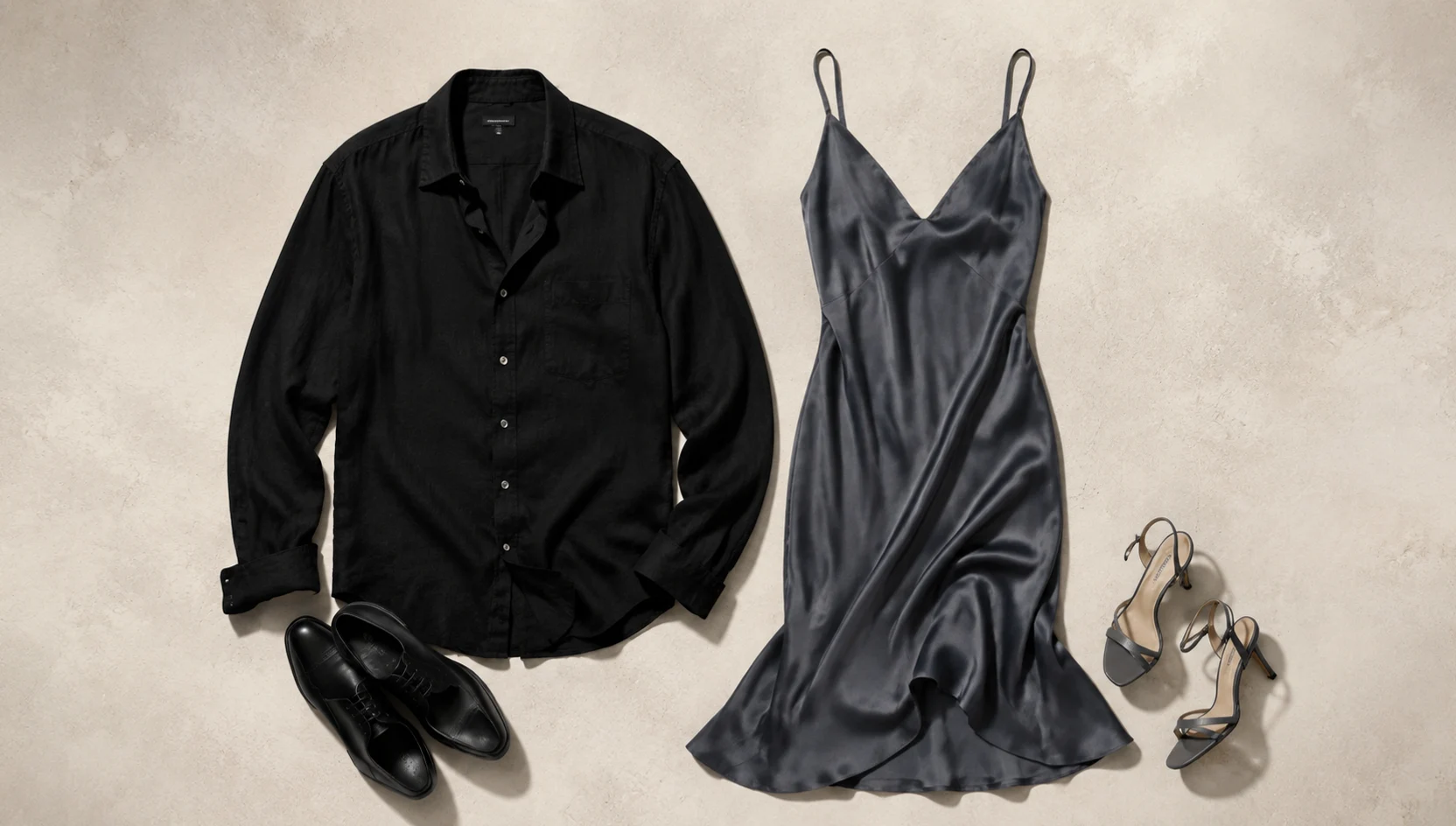 Outfit ideas for sitting close on stone steps against sunset skyline engagement photos